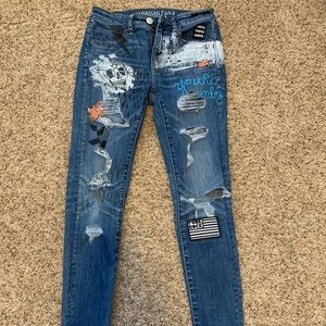 american eagle jeans with patches/drawings 2